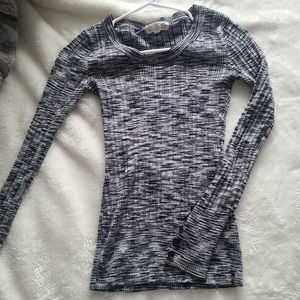Long sleeve gray fitted shirt.